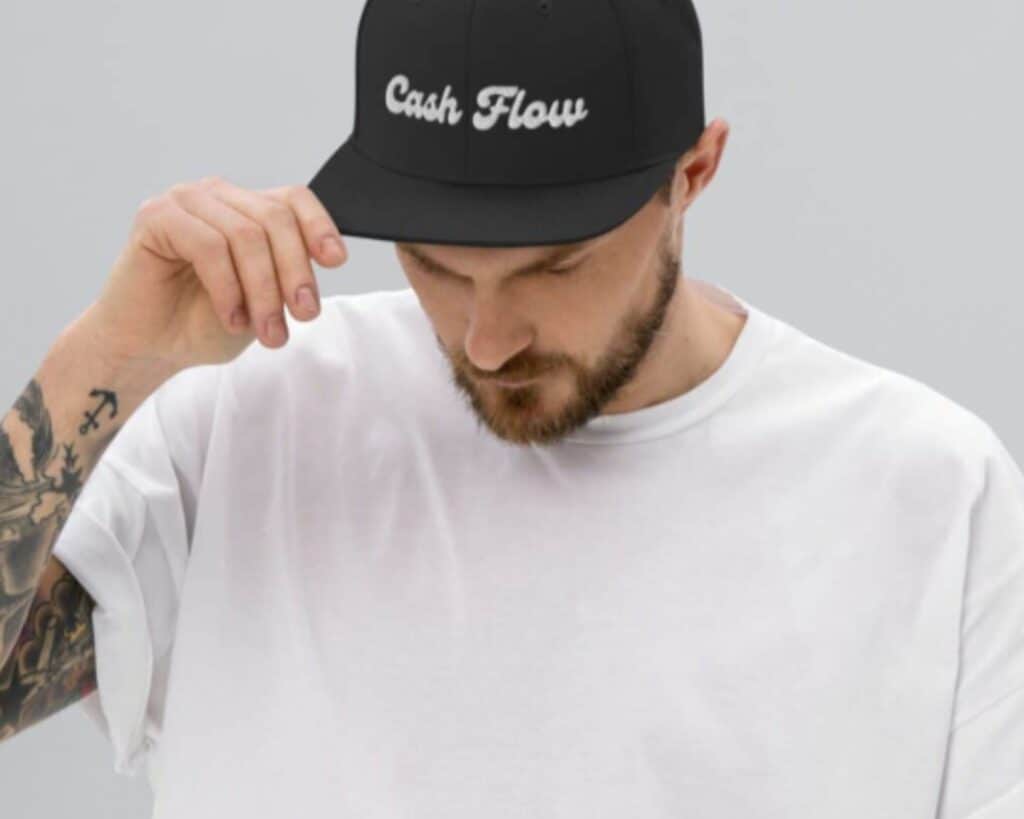 A hat with the words cash flow embroidered on it.